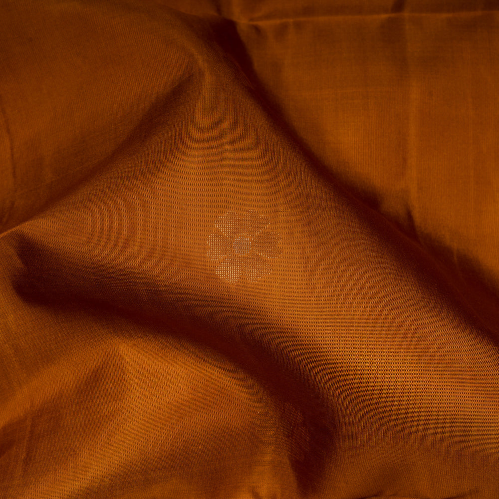 Close-up of brown fabric with a floral pattern