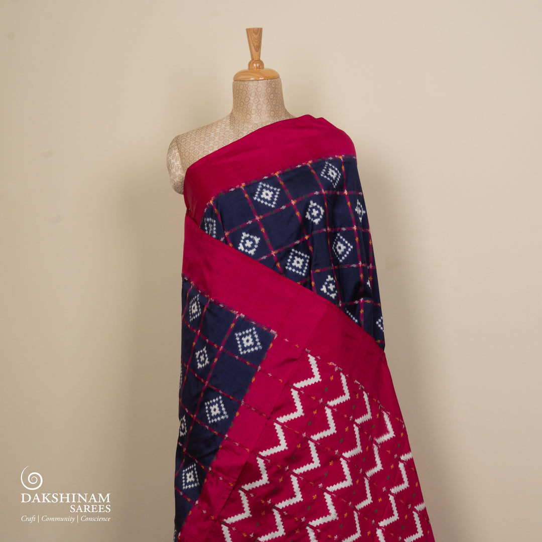 Pleats/body of Handwoven Navy Blue with Pink Double Ikat silk Saree