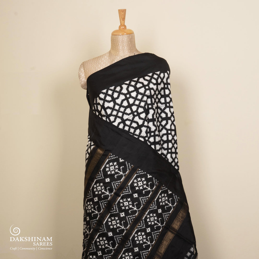 Pleats/body of Handwoven Black with white Double Ikat silk Saree
