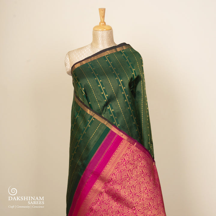 Pleats/body of Handwoven Bottle Green with Pink Borderless Kanjivaram silk Saree