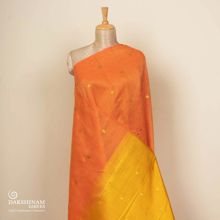 Pleats/body of Handwoven Borderless Linen Kanjivaram silk Saree in Orange and Yellow color