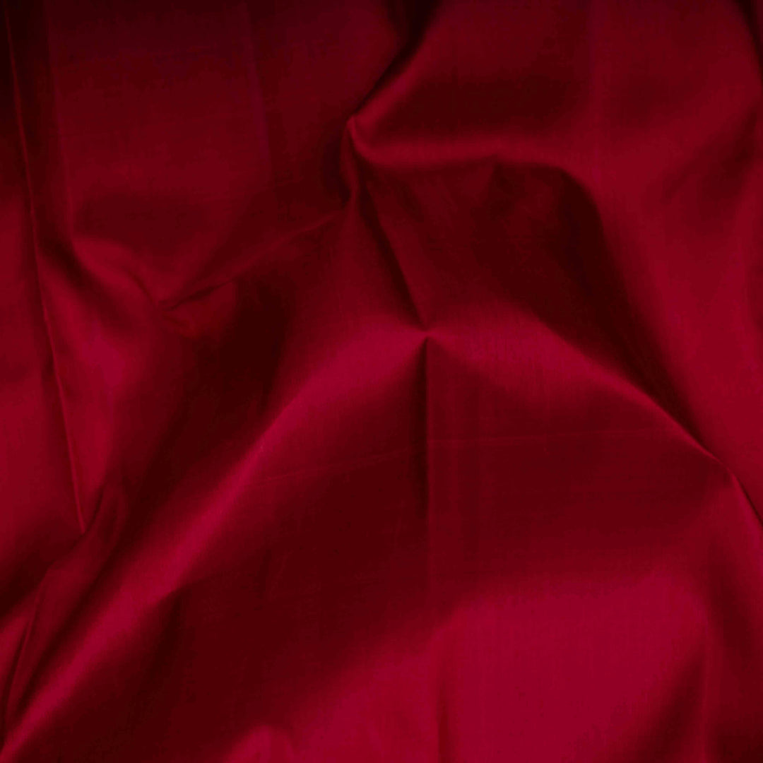 Close-up of red fabric with folds
