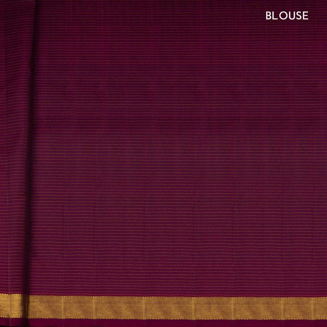 Blouse of Handwoven Checks & Stripes Kanjivaram silk saree in black and magenta color