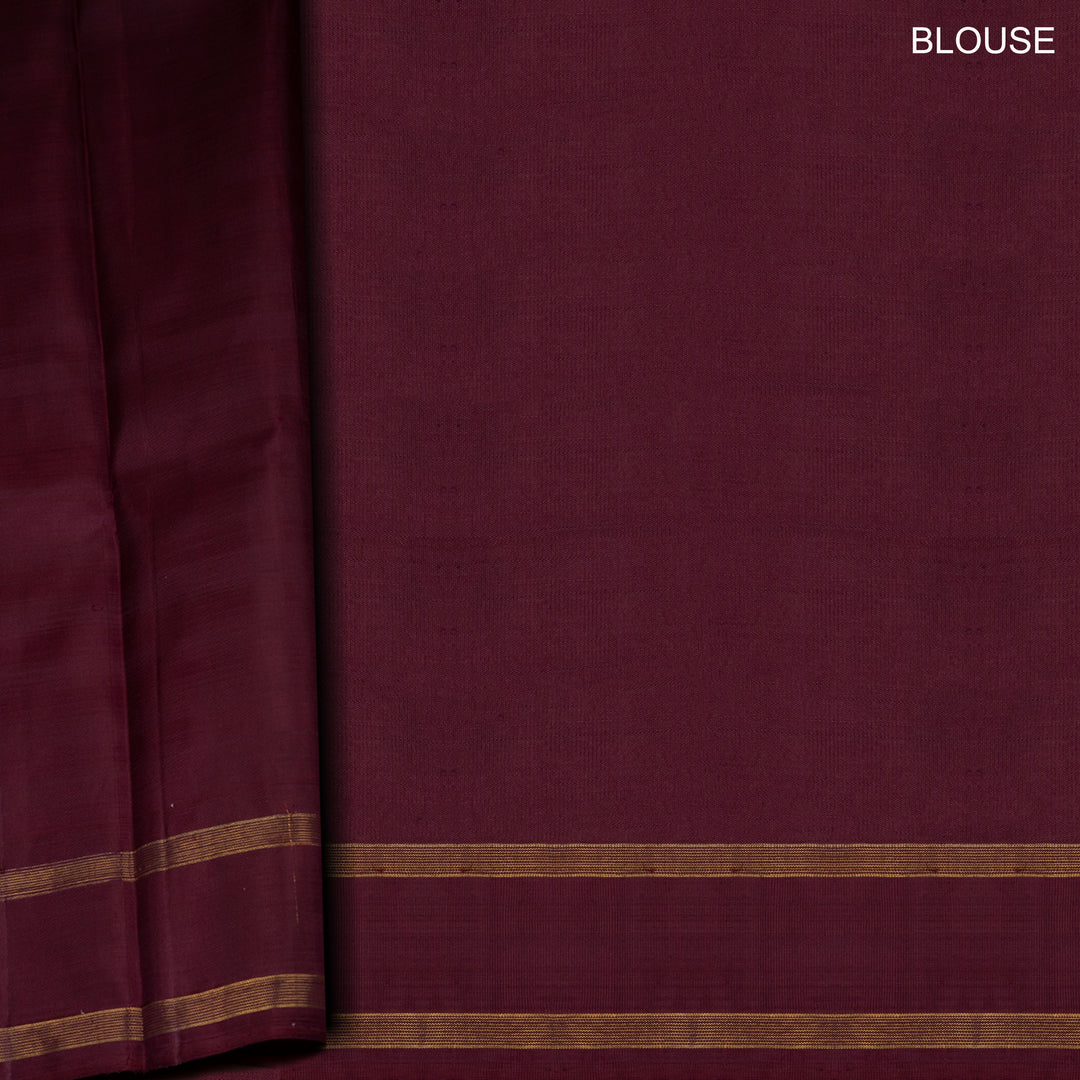 Maroon fabric with gold stripes and 'BLOUSE' text