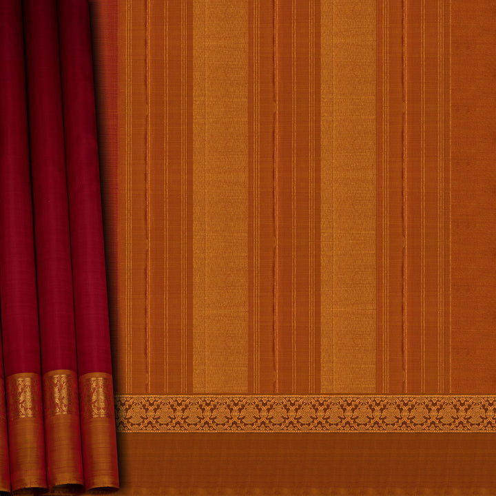 Red and orange fabric with a decorative border