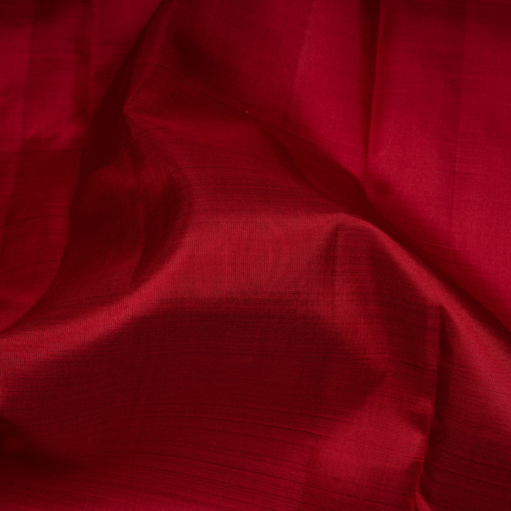 Close-up of red fabric with visible texture