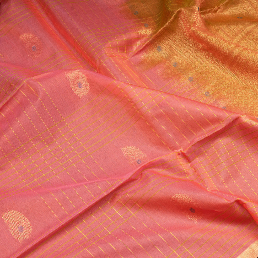 Peach silk cotton saree with paneled checks, mango butta, gold tissue border and orange floral pallu
