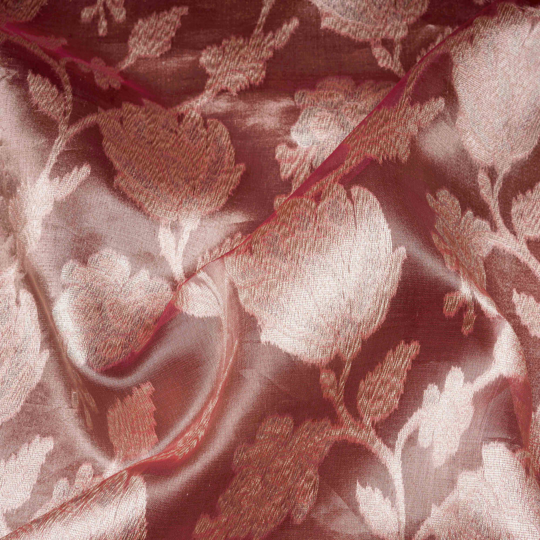 Light pink organza Banarasi silk saree with floral zari vines and zigzag patterned border