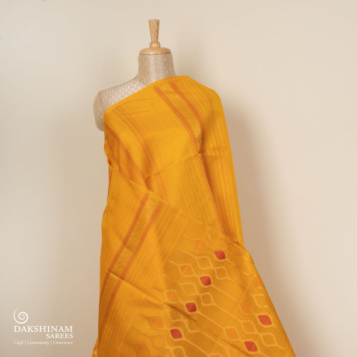 Yellow Kora soft silk saree with dotted stripe pattern and gold zari diamond band with designer pallu