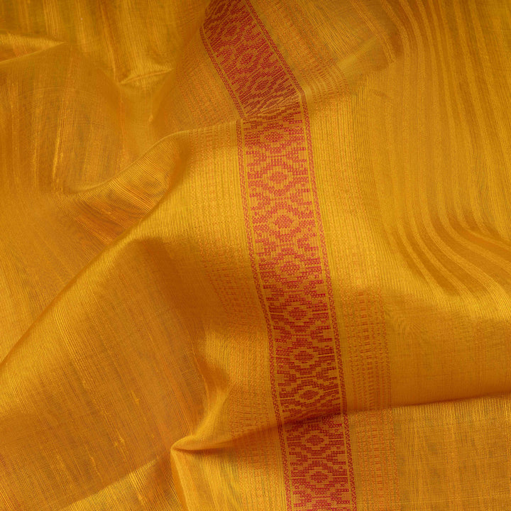Yellow Kora soft silk saree with dotted stripe pattern and gold zari diamond band with designer pallu