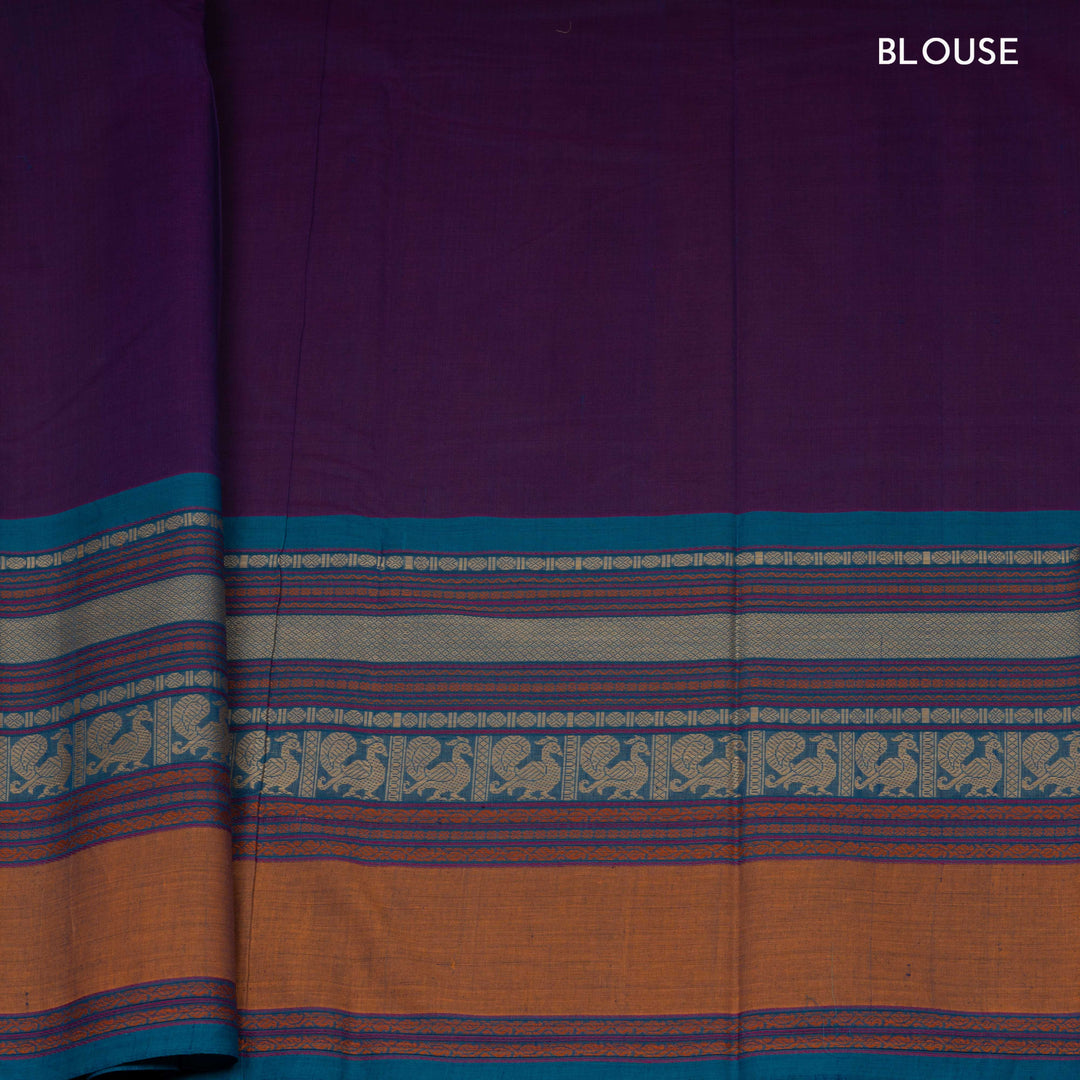 Purple Kanchi cotton saree with plain body, mango design border, mayil butta and traditional pallu with matching blouse
