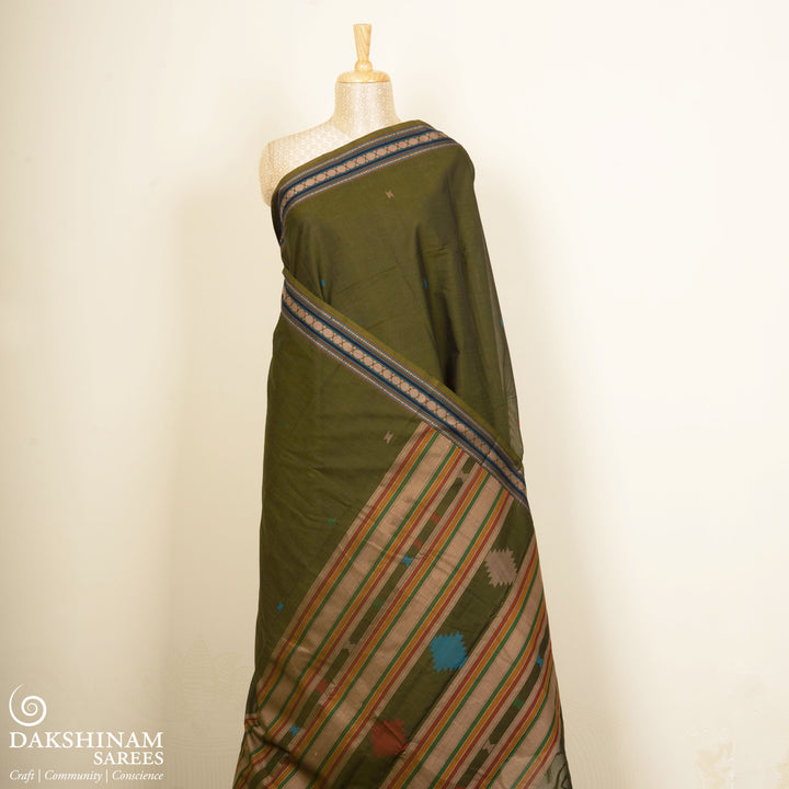 Green Kanchi cotton saree with diamond butta body, rudraksh border and multicolor thread band pallu with matching blouse