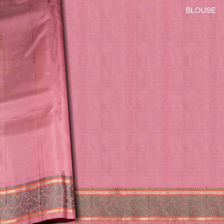 Orange Kanjivaram silk saree with floral butta, pink annam border and traditional pallu with matching blouse