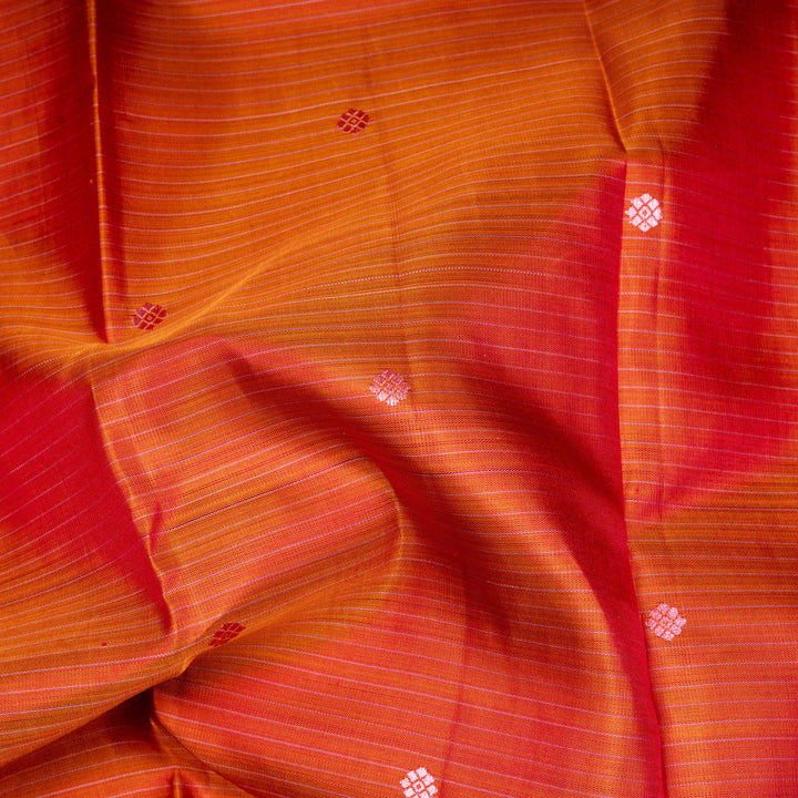 Orange Kanjivaram silk saree with floral butta, pink annam border and traditional pallu with matching blouse