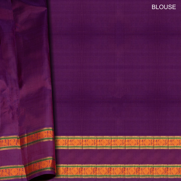 Olive green Kanjivaram silk saree with checks, annam and chakram butta, violet rettapet border and matching blouse