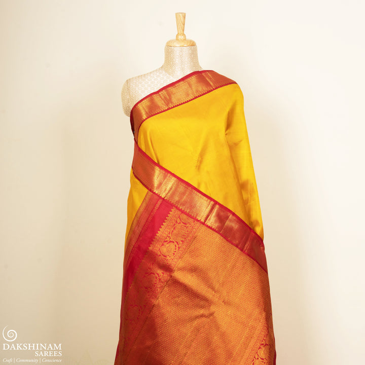 Yellow Kanjivaram Silk Saree with Rudraksham Border and Red Pallu