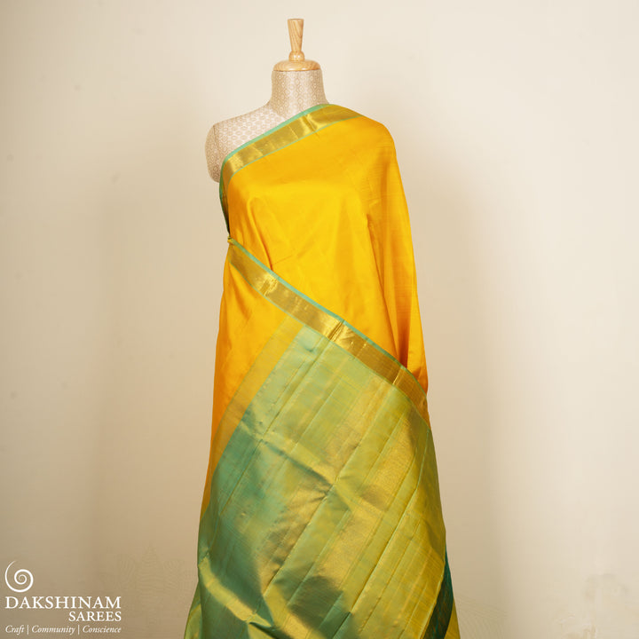 Yellow Kanjivaram Silk Saree with Dual-Tone Aqua Blue Border