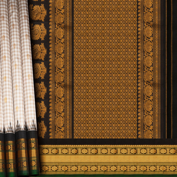 Off white Gadwal silk saree with small checks, dark green border and gold zari traditional motifs