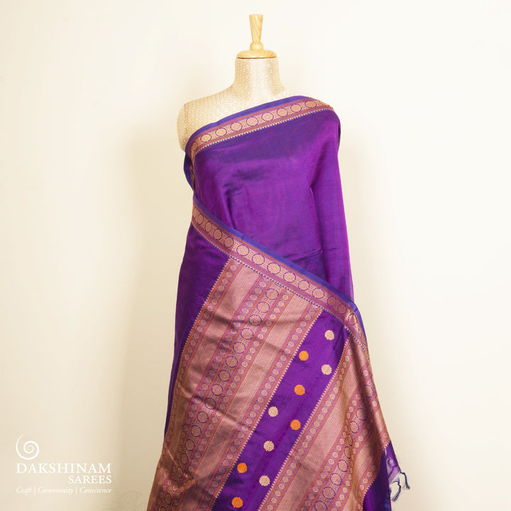 Plain violet silk cotton saree with thread woven rudraksham border and temple chakra pallu design