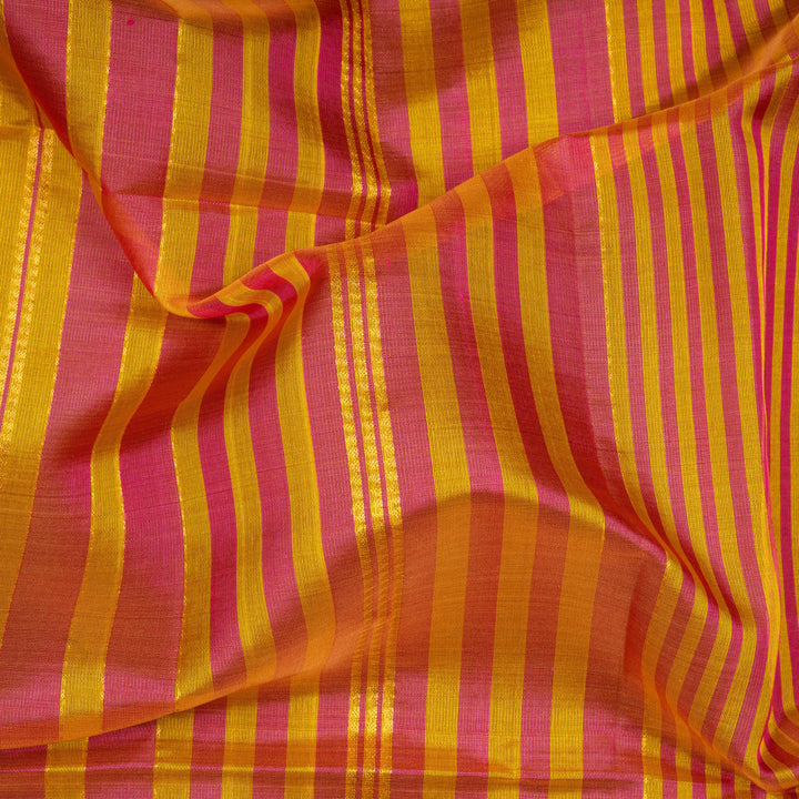 Multicolor Kora soft silk saree with alternating yellow and pink bands and gold zari lines, thin gold tissue border and pink pallu with chevron and triangle motifs.