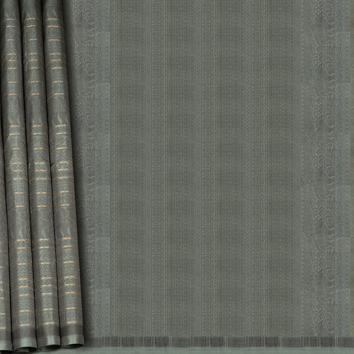 Grey soft silk saree with multithread motifs like elephant, rudraksham, chevron, diamond and mango patterns with matching pallu and plain blouse.