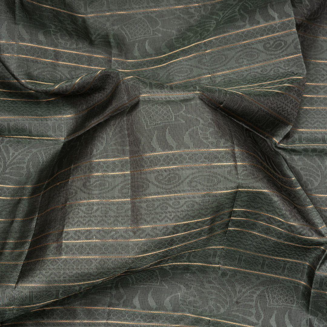 Grey soft silk saree with multithread motifs like elephant, rudraksham, chevron, diamond and mango patterns with matching pallu and plain blouse.