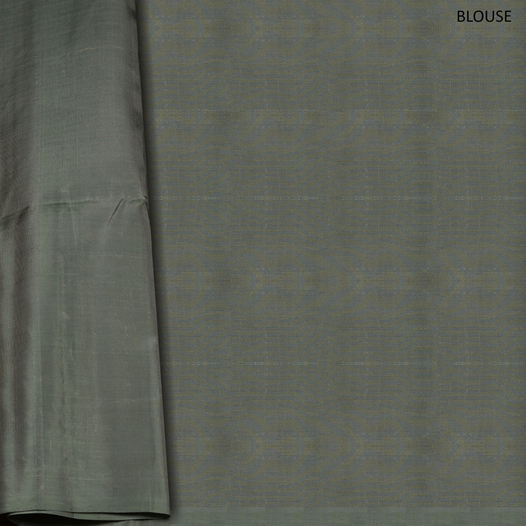 Grey soft silk saree with multithread motifs like elephant, rudraksham, chevron, diamond and mango patterns with matching pallu and plain blouse.