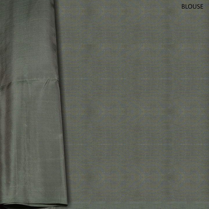 Grey soft silk saree with multithread motifs like elephant, rudraksham, chevron, diamond and mango patterns with matching pallu and plain blouse.