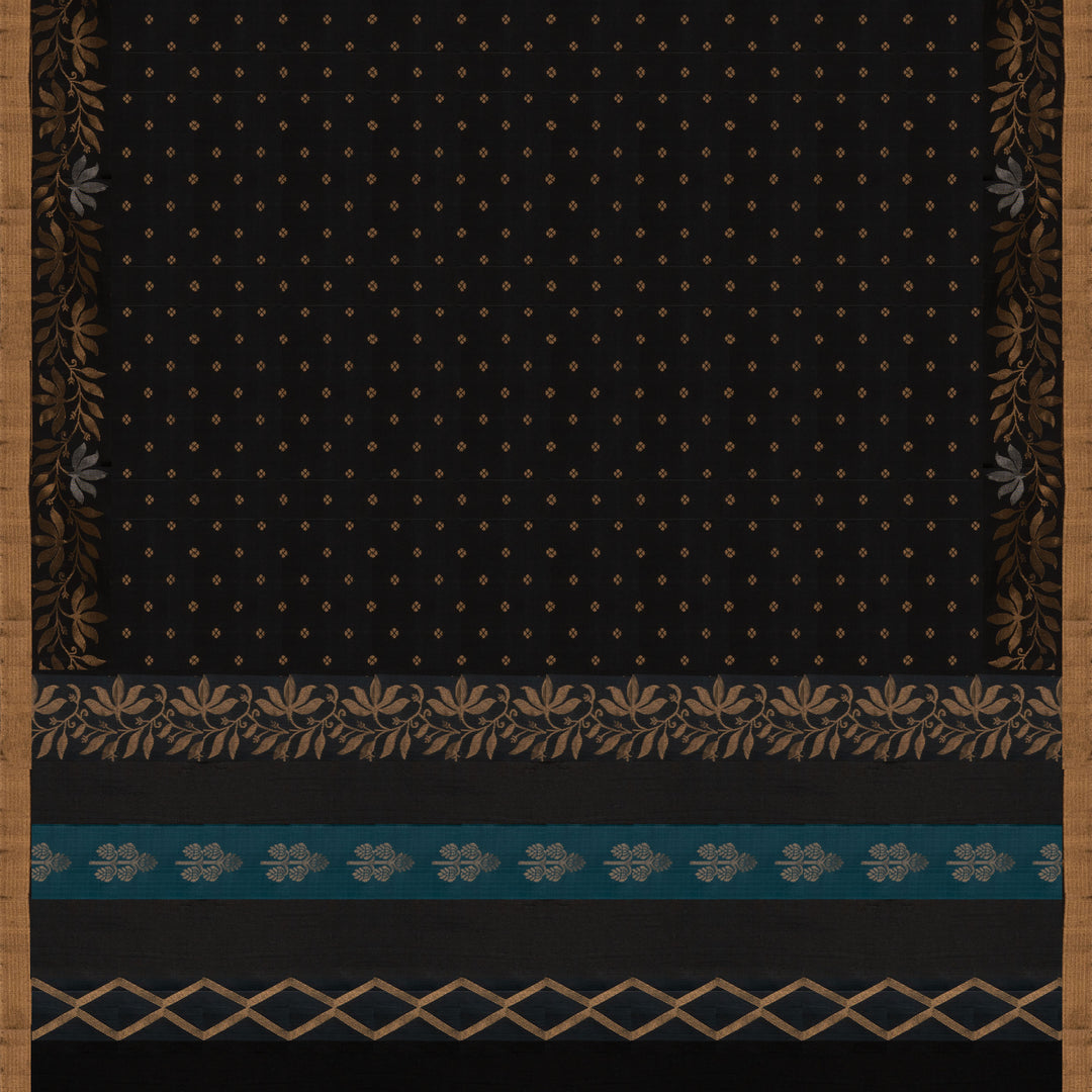 Black soft silk saree with small gold and silver zari buttas, floral border and blue contrast pallu with diamond and floral motifs.