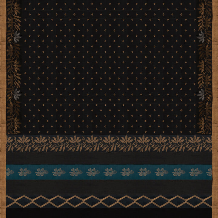 Black soft silk saree with small gold and silver zari buttas, floral border and blue contrast pallu with diamond and floral motifs.