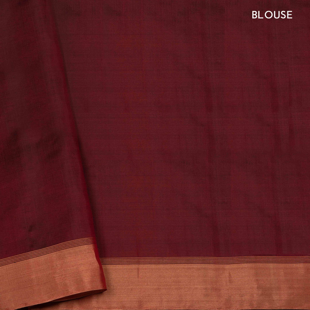 Brown soft silk saree with striped body and triangle motifs, gold tissue border and maroon black pallu with geometric patterns.