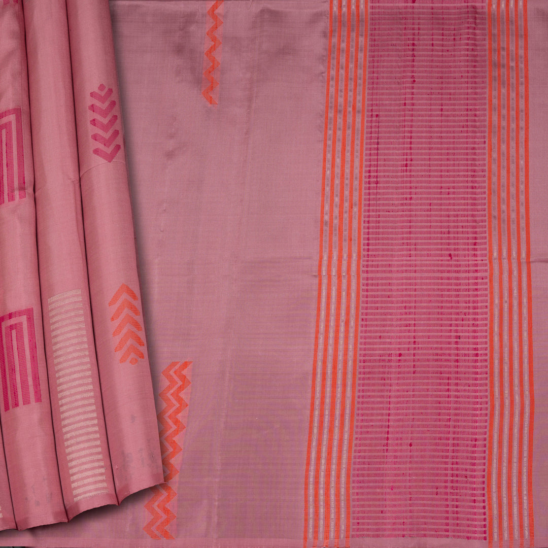 Light pink borderless soft silk saree with dotted lines, geometric square and rectangle patterns with silver zari and striped pallu.