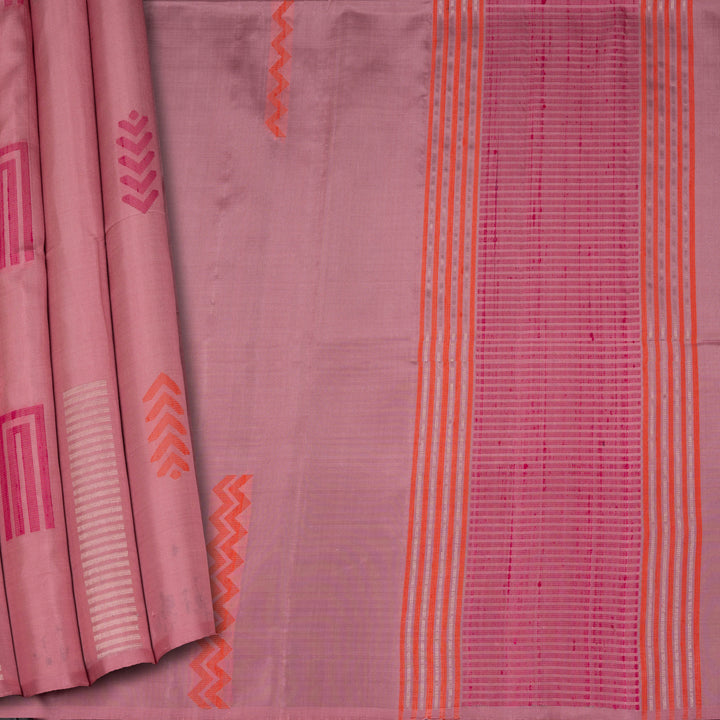 Light pink borderless soft silk saree with dotted lines, geometric square and rectangle patterns with silver zari and striped pallu.