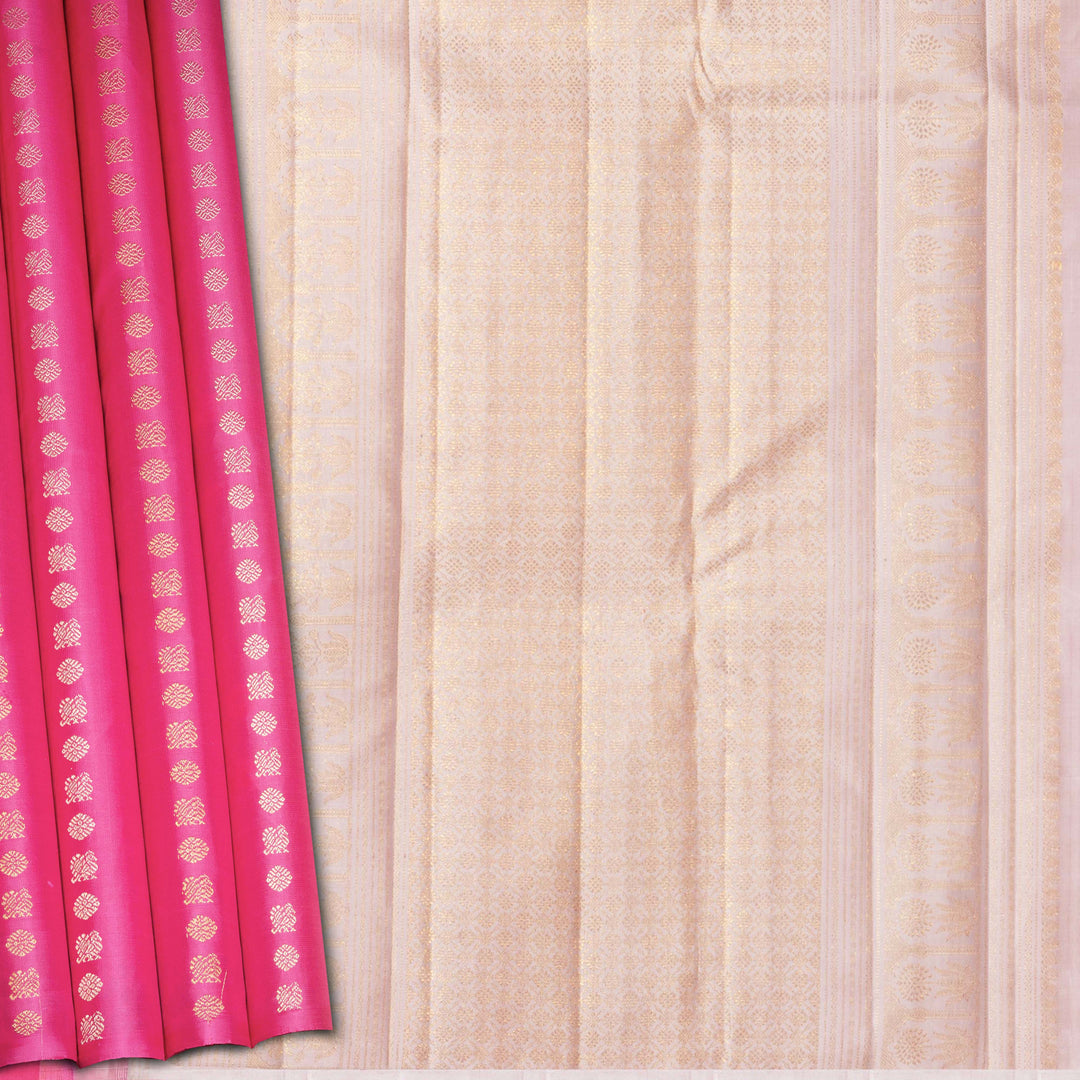 Pink handwoven Kanjivaram silk saree with vertical annam and chakram zari buttas, grey pallu with floral and traditional motifs, paired with grey blouse.
