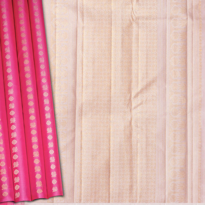 Pink handwoven Kanjivaram silk saree with vertical annam and chakram zari buttas, grey pallu with floral and traditional motifs, paired with grey blouse.