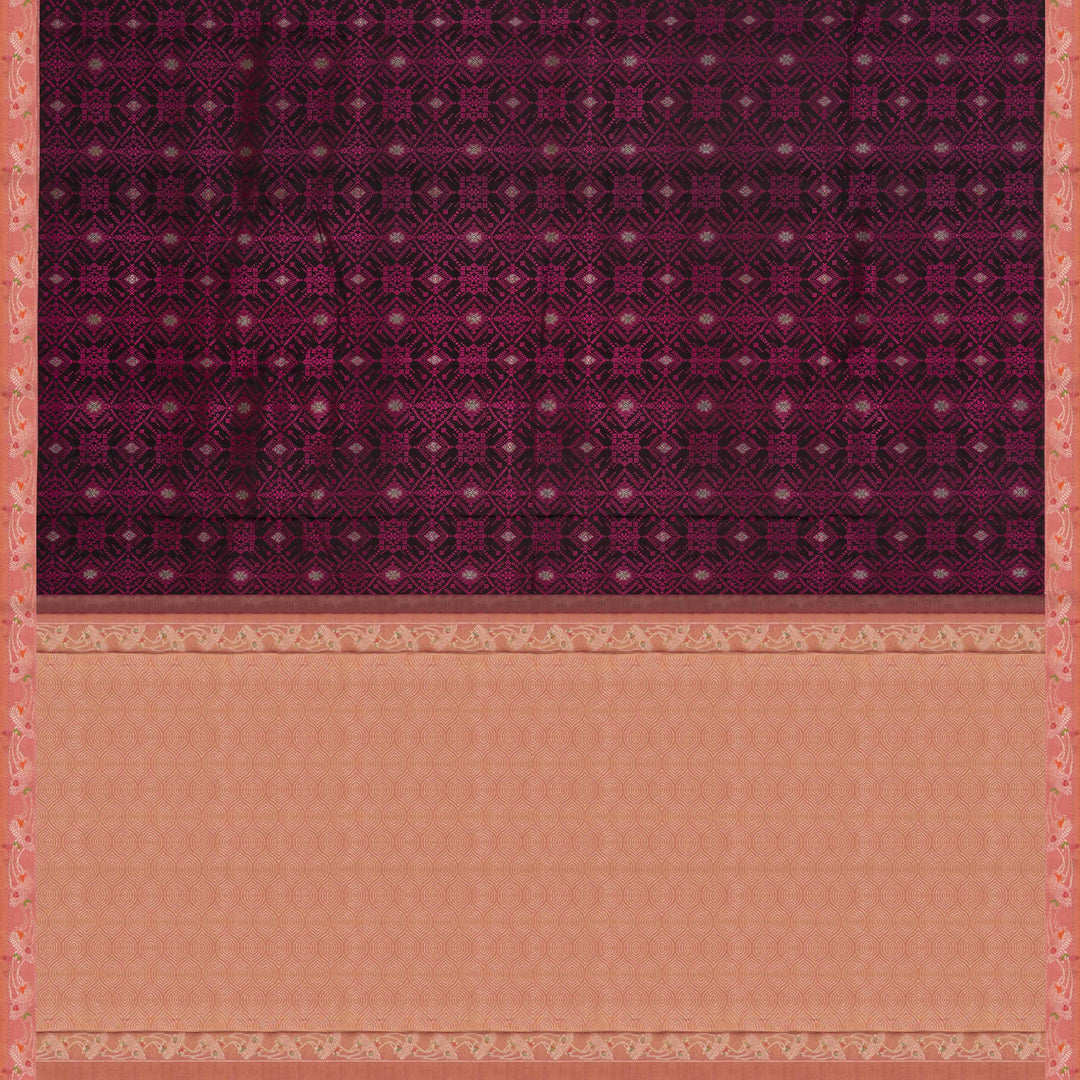 Black handwoven Kanjivaram silk saree with pink thread work, diamond and star zari motifs, peach floral meenakari border, and matching pallu, paired with peach blouse.