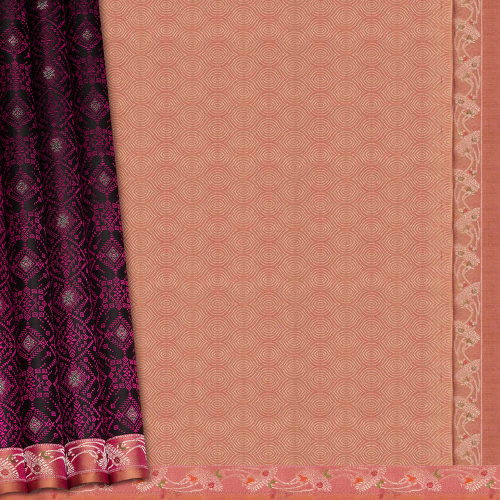 Black handwoven Kanjivaram silk saree with pink thread work, diamond and star zari motifs, peach floral meenakari border, and matching pallu, paired with peach blouse.