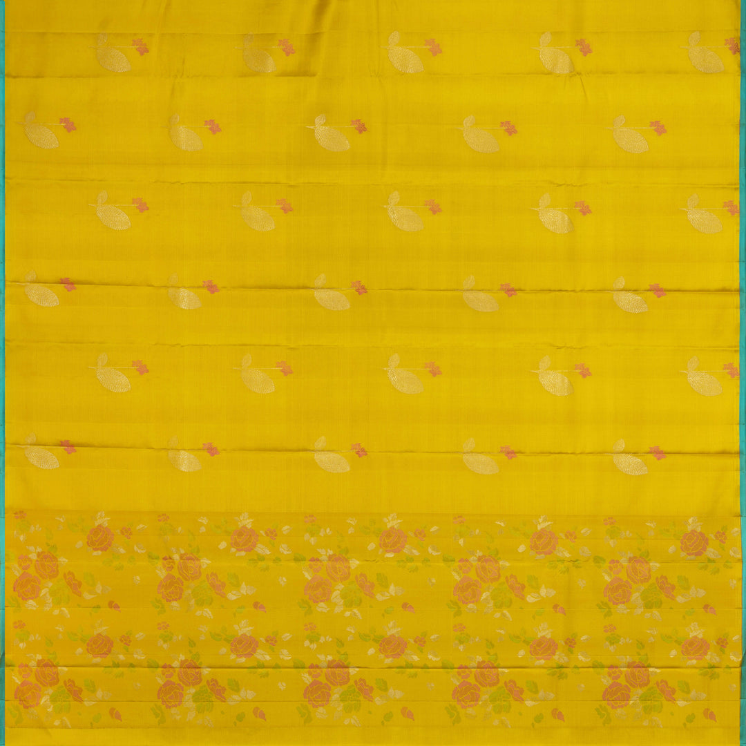 Lime green handwoven Kanjivaram silk saree with floral and leaf motifs, rose design pallu, borderless style, paired with light blue blouse with silver zari stripes.