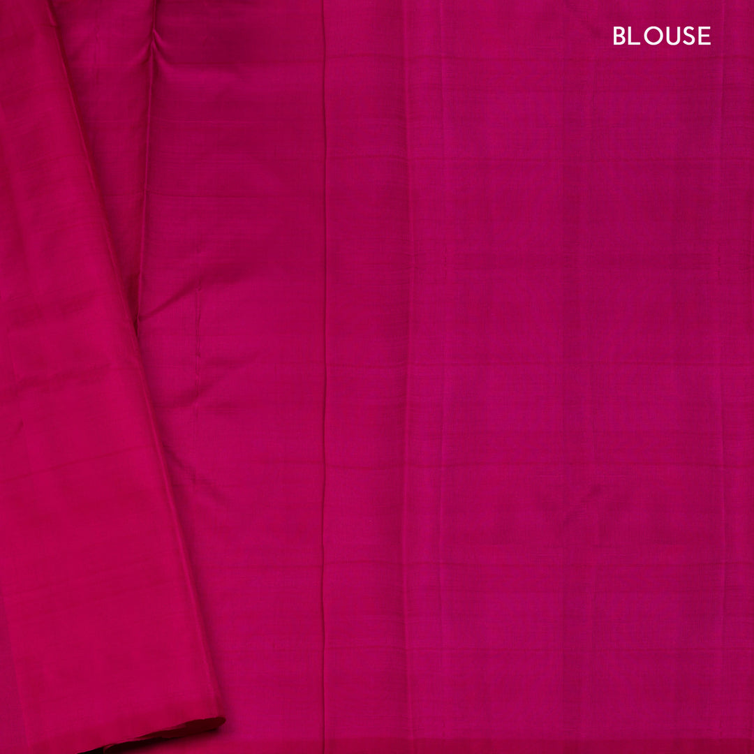 Black handwoven Kanjivaram silk saree with magenta checks, annam and chakram motifs, and pink pallu with gold zari chevron and leaf designs, paired with magenta blouse.