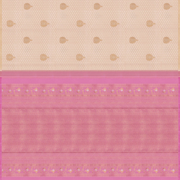Beige handwoven Kanjivaram silk saree with self design and gold zari floral motifs, lavender border and pallu with chevron and floral patterns, paired with lavender blouse.
