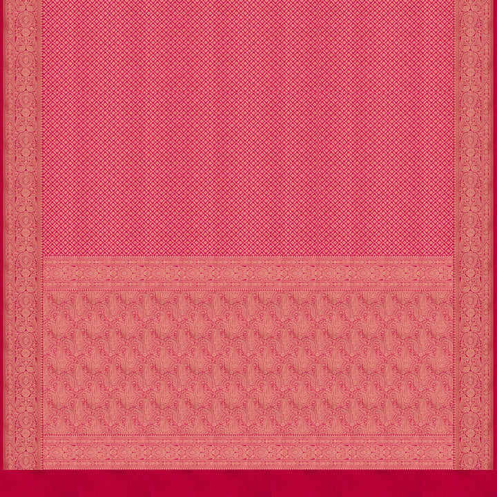Pink Banarasi silk saree with gold brocade, diamond and vaira mookuthi buttas, paisley border with dotted and malli moggu design and matching pallu.