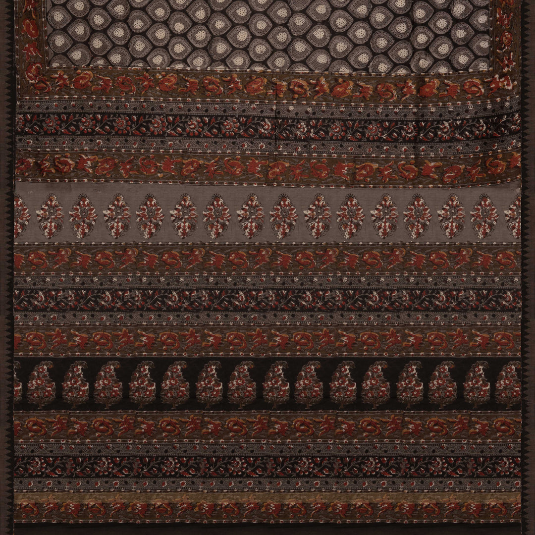 Grey handwoven Chanderi silk saree with Ajrakh print, gicha temple border, floral pallu design, paired with grey blouse with floral vines.