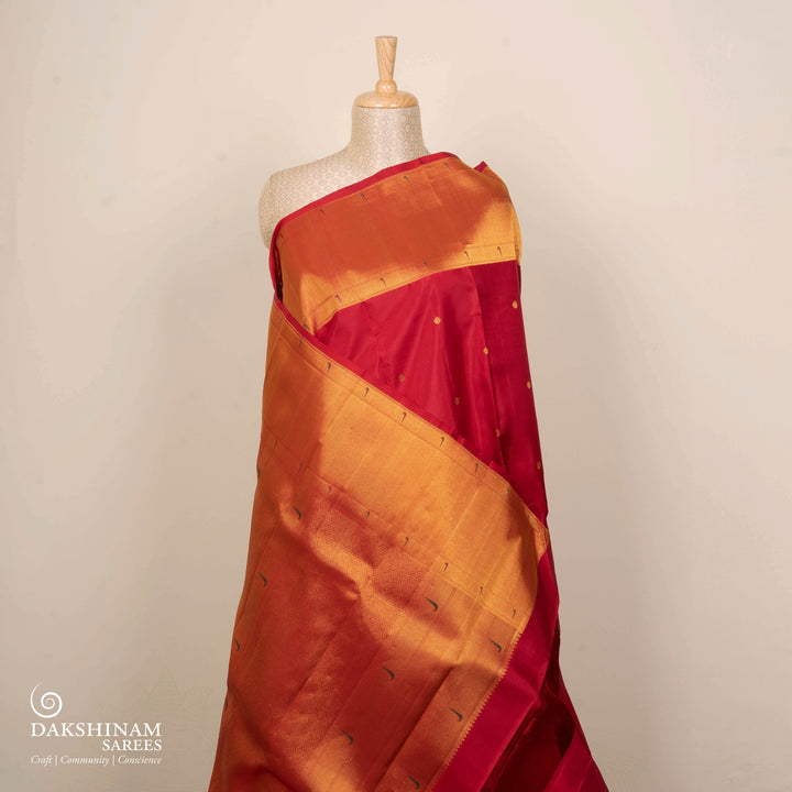Red Kanjivaram silk saree with gold zari floral butta, Paithani border and diamond butta pallu with matching blouse
