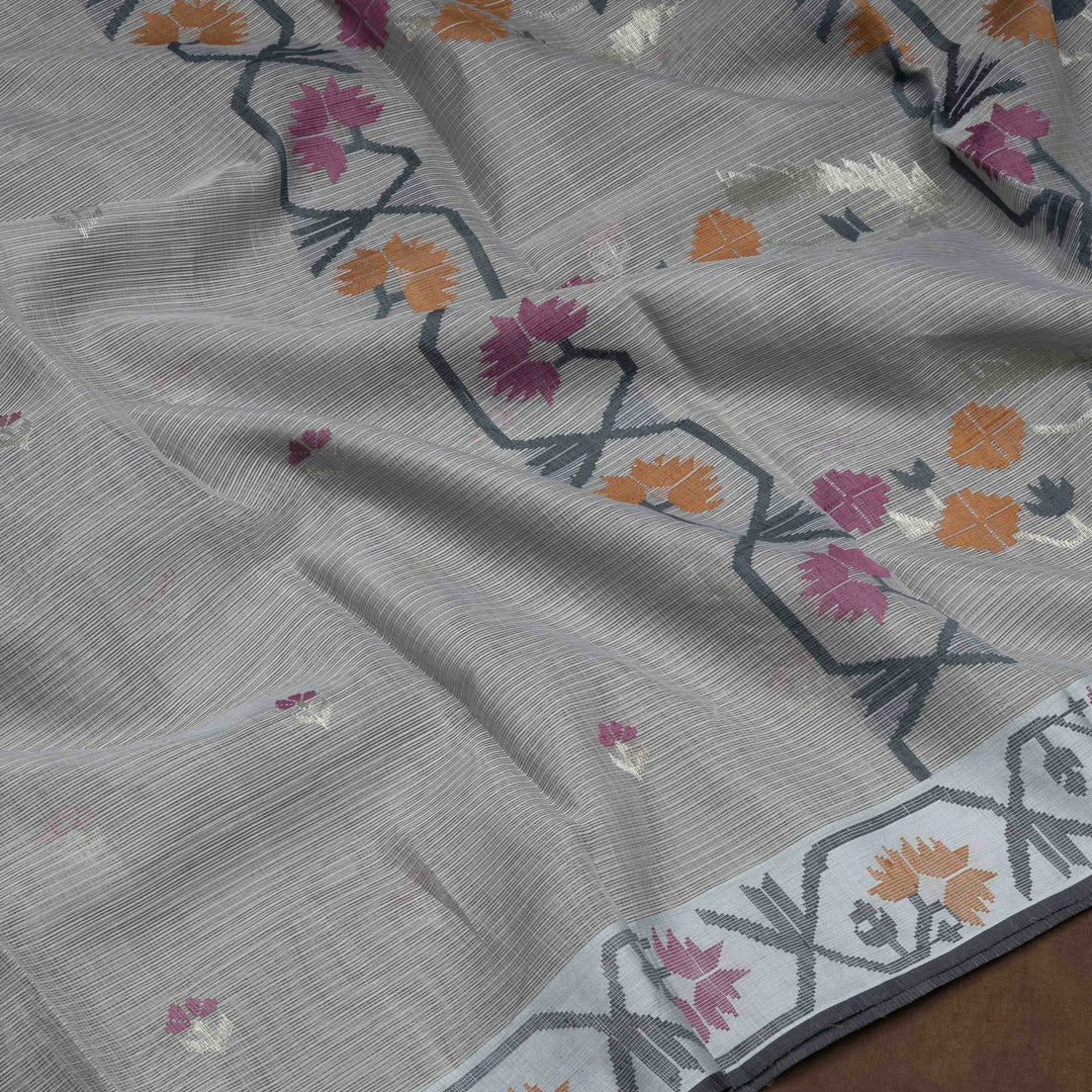 Grey Kota doria silk saree with silver zari floral butta, floral pallu and vine border with matching blouse