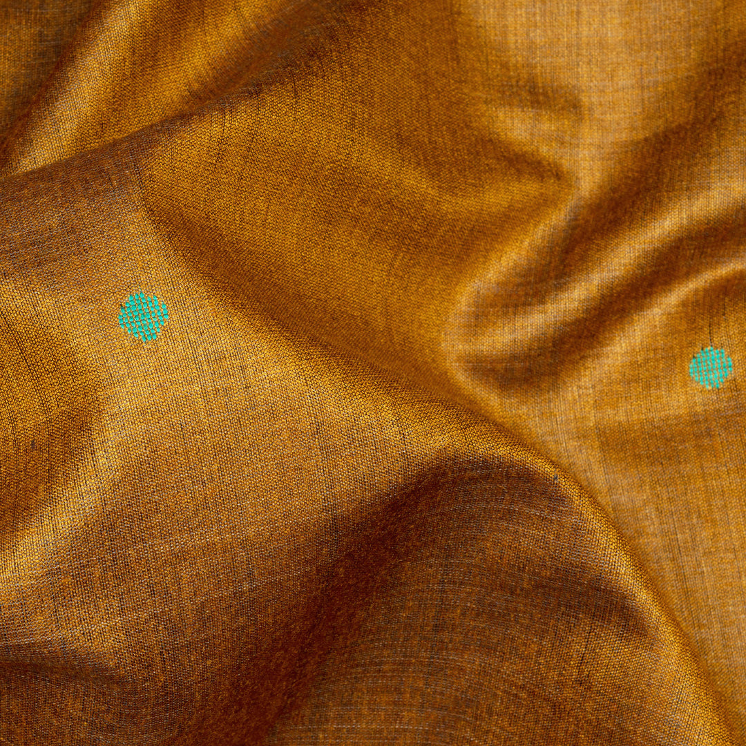 Mustard tussar silk Paithani saree with dotted body, gold zari border and multicolor bird jamdani pallu with matching blouse