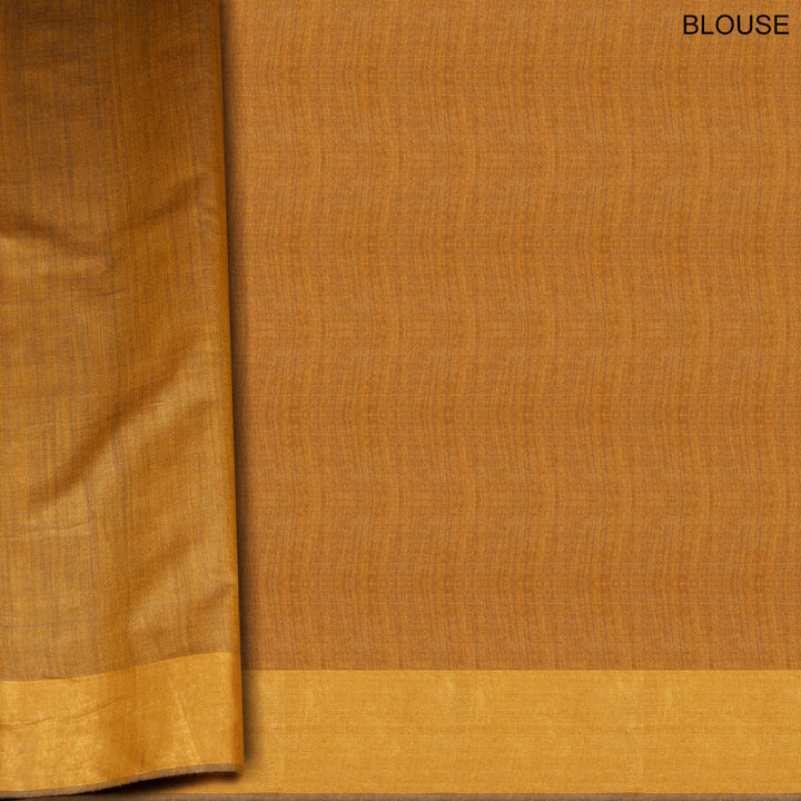 Mustard tussar silk Paithani saree with dotted body, gold zari border and multicolor bird jamdani pallu with matching blouse