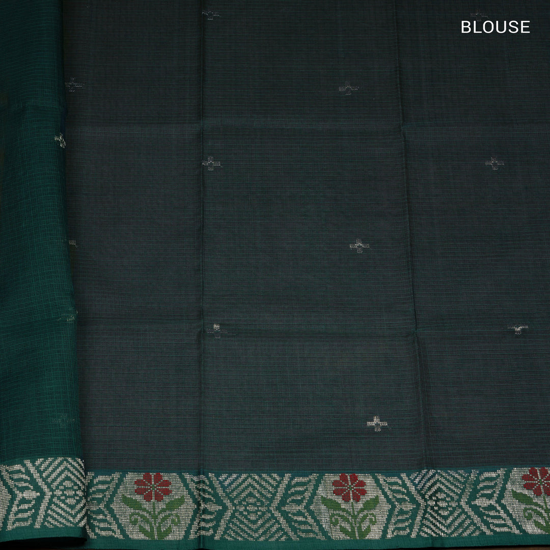 Moss green Kota doria silk saree with silver zari floral motifs, monotone border and pallu with silk thread flowers and chevron blouse