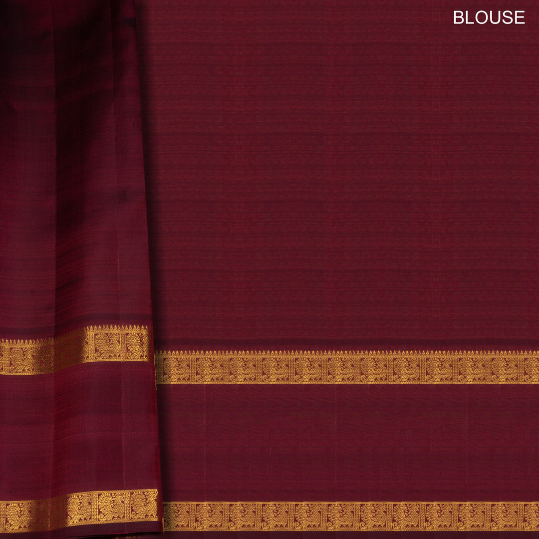 Mauve Kanjivaram silk saree with vairaoosi checks, maroon rettapet annam border and rich diamond pallu with matching blouse