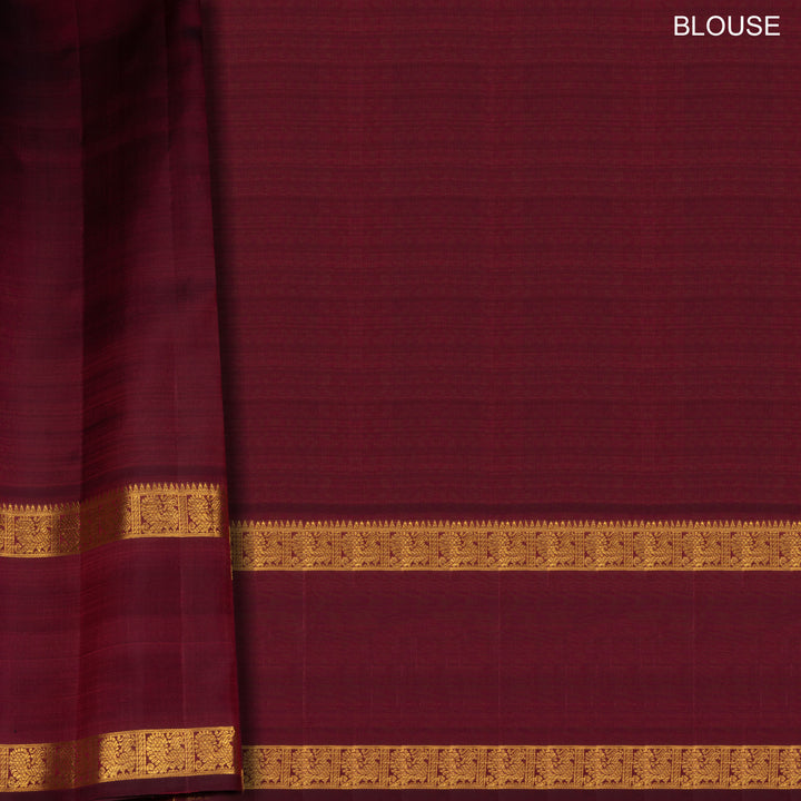 Mauve Kanjivaram silk saree with vairaoosi checks, maroon rettapet annam border and rich diamond pallu with matching blouse