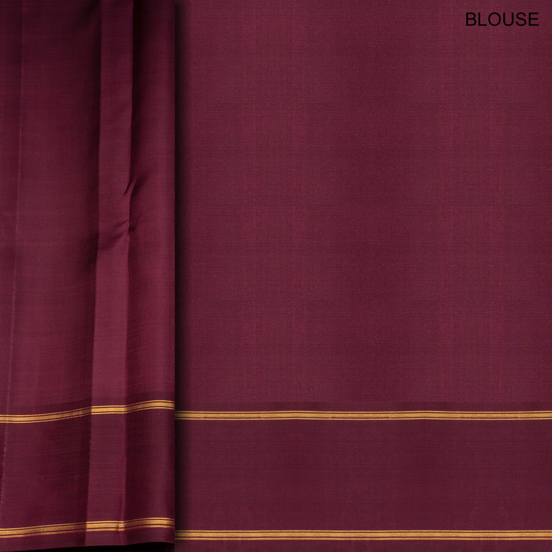 Magenta Kanjivaram silk saree with checks, maroon gold zari rettapet border and striped pallu with matching blouse